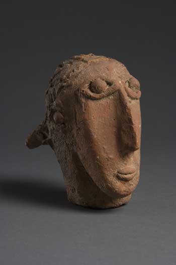 This ceramic head is from the Beta Israel (literally,
 House of Israel) culture of Ethiopia, comprised of Jews of Ethiopian 
descent that have had a presence in Ethiopia since the 14th century. 
Though primarily agricultural, they are also known for their exquisite 
crafts and jewelry as well as blacksmithing and pottery-making. Photo by
 Thomas R. DuBrock